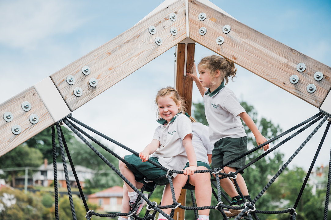 children-climbing-in-playground Children climbing in playground.